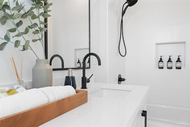 13844 Red Drum Ct, Perdido Key, FL 32507 - bathroom view of vanity and shower / bathtub combination