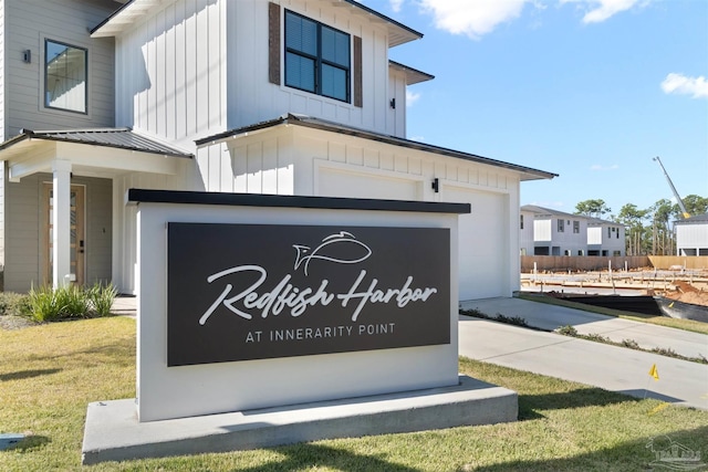 13844 Red Drum Ct, Perdido Key, FL 32507 - community / neighborhood sign with an attached garage