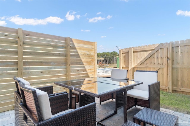 13844 Red Drum Ct, Perdido Key, FL 32507 - view of patio with outdoor dining space