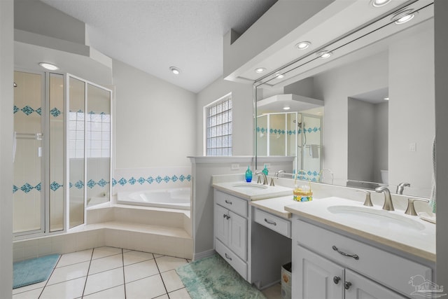 full bathroom featuring a sink, a bath, and a shower stall