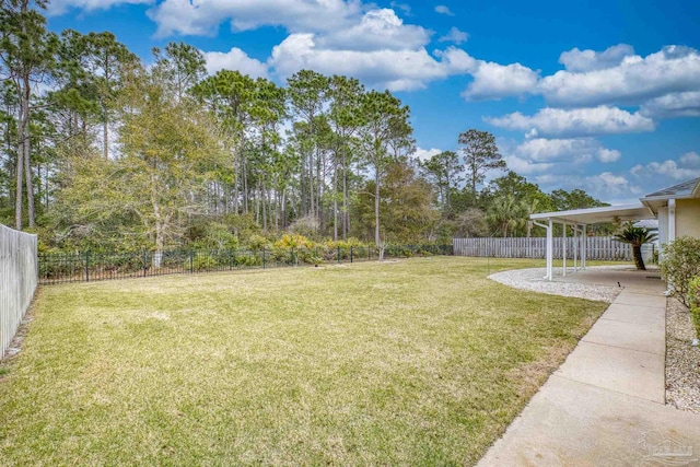 view of yard with a fenced backyard