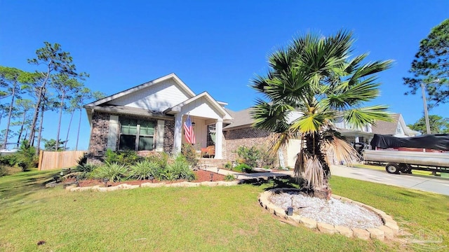 view of front of home with a front lawn