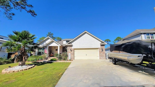 view of front facade with a garage and a front yard