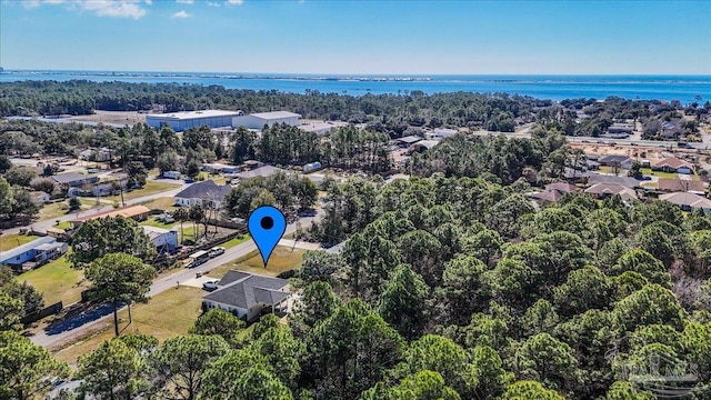 birds eye view of property with a residential view and a water view