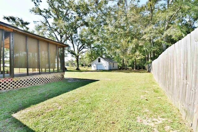 view of yard with a sunroom