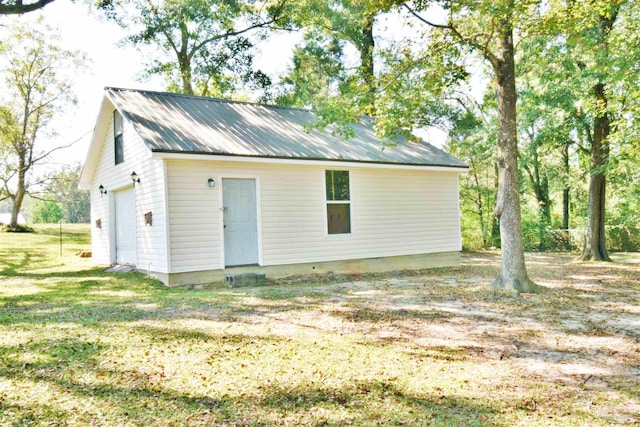 exterior space with a lawn