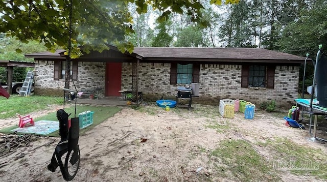 view of front facade with a trampoline