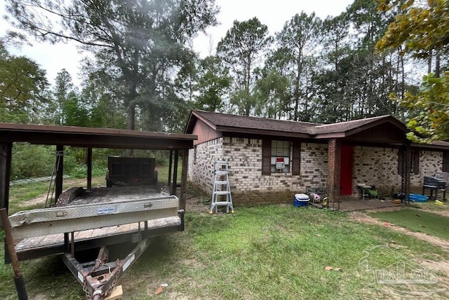 exterior space featuring a yard