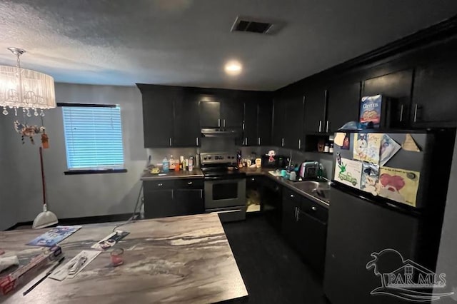 kitchen with dark hardwood / wood-style flooring, black fridge, electric stove, decorative light fixtures, and a notable chandelier