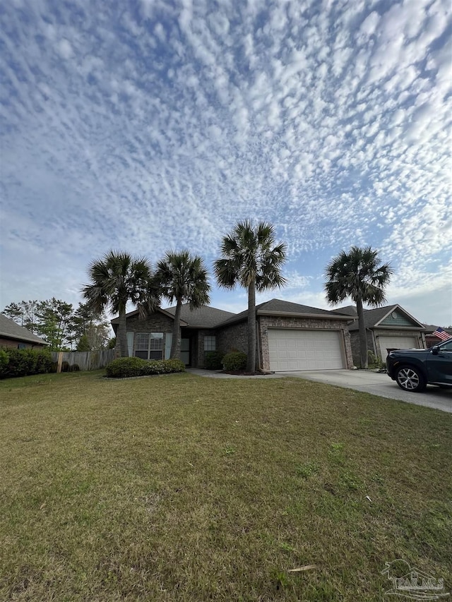 3026 Windward Cove Ct, Gulf Breeze, FL 32563 - view of front facade featuring a garage, driveway, and brick siding