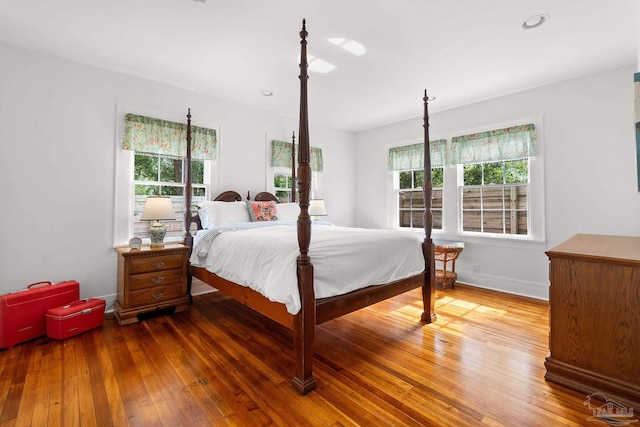 bedroom featuring dark wood-type flooring