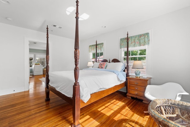 bedroom featuring hardwood / wood-style flooring