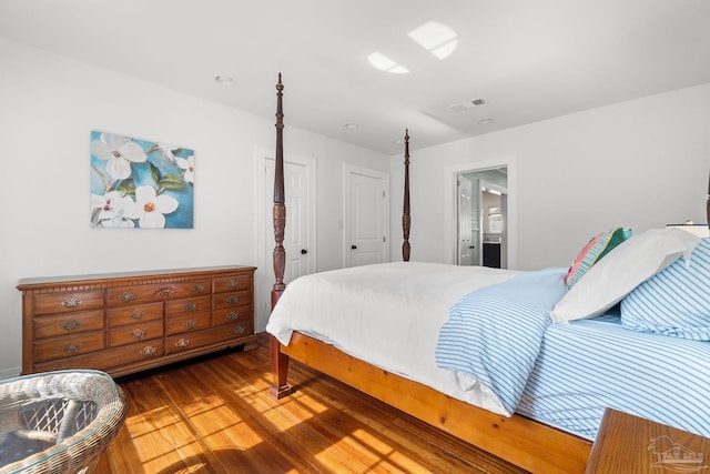 bedroom featuring hardwood / wood-style flooring