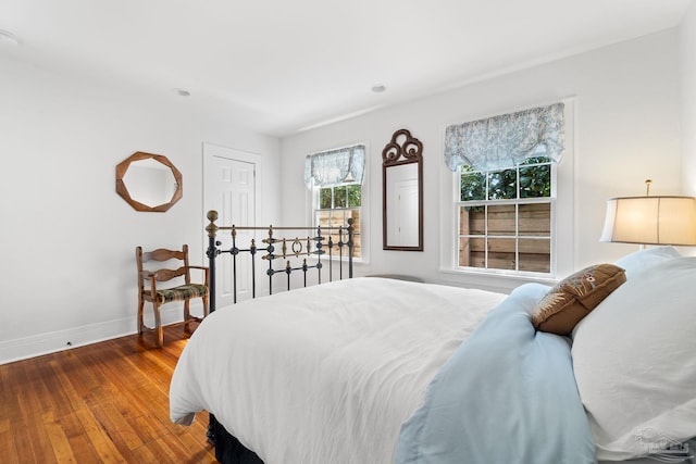 bedroom with wood-type flooring