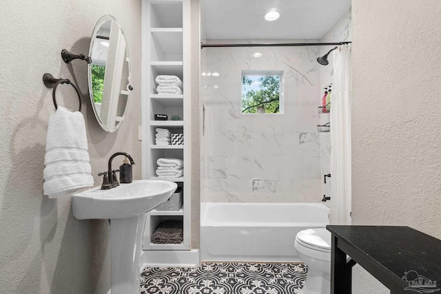 bathroom with toilet and shower / tub combo