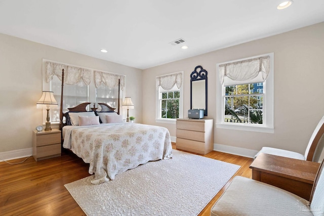 bedroom with wood-type flooring