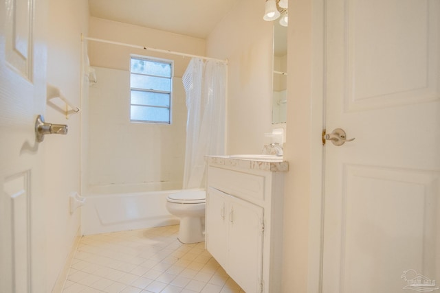 full bathroom featuring toilet, vanity, tile patterned floors, and shower / bath combo with shower curtain