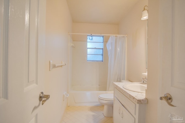 full bathroom featuring shower / bath combo with shower curtain, tile patterned flooring, vanity, and toilet