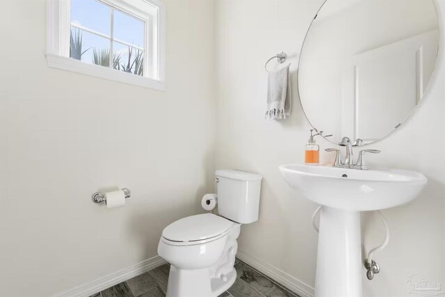 14478 Salt Meadow Dr, Pensacola, FL 32507 - half bath with baseboards and toilet
