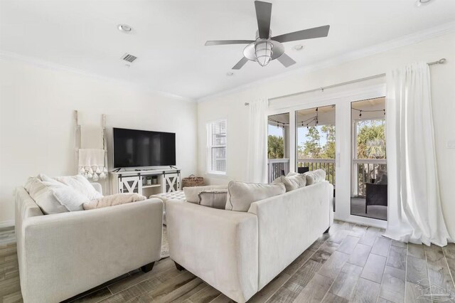 14478 Salt Meadow Dr, Pensacola, FL 32507 - living area with crown molding, ceiling fan, wood tiled floors, and recessed lighting
