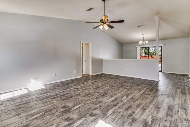 spare room with dark wood-type flooring, ceiling fan with notable chandelier, and high vaulted ceiling