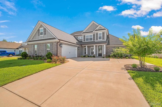 6264 Howie Way, Pace, FL 32571 - craftsman-style home featuring concrete driveway, board and batten siding, a front yard, and brick siding