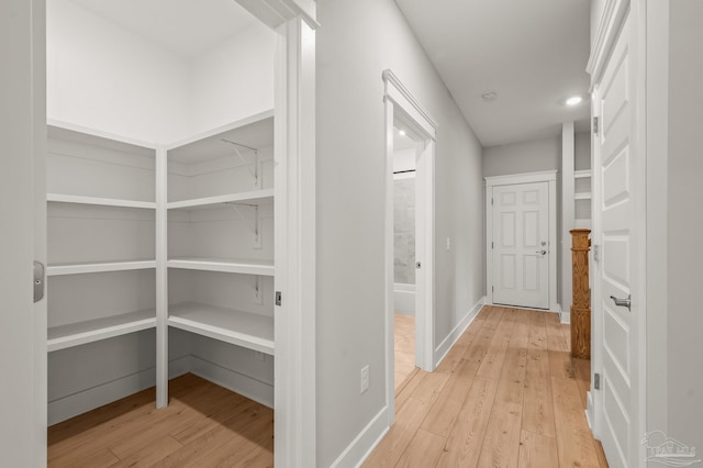 6264 Howie Way, Pace, FL 32571 - corridor featuring light wood-style flooring and recessed lighting