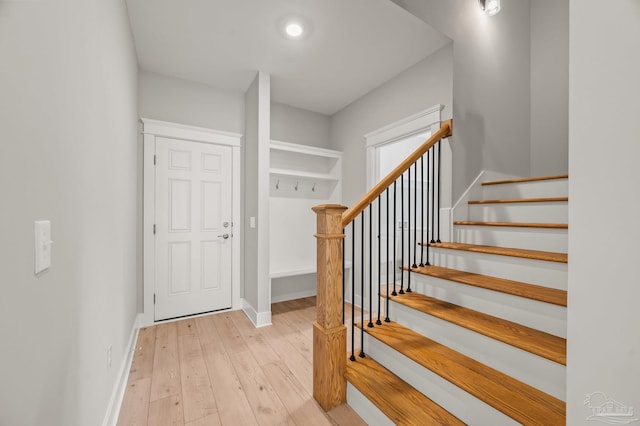 6264 Howie Way, Pace, FL 32571 - foyer with light wood-style flooring and stairs