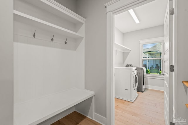 6264 Howie Way, Pace, FL 32571 - laundry room with washing machine and clothes dryer and light wood finished floors