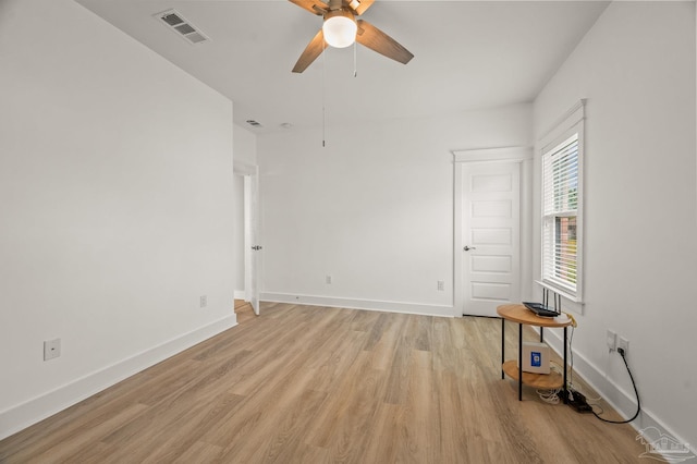6264 Howie Way, Pace, FL 32571 - empty room with light wood finished floors and a ceiling fan