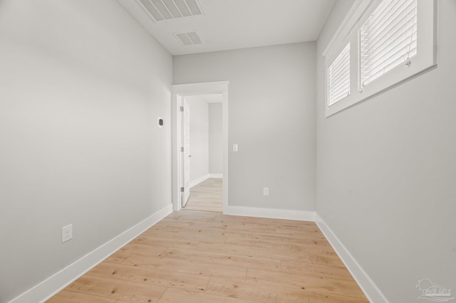 6264 Howie Way, Pace, FL 32571 - empty room featuring light wood-type flooring and baseboards