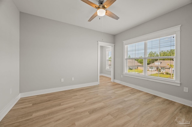 6264 Howie Way, Pace, FL 32571 - empty room featuring a ceiling fan and light wood-style floors