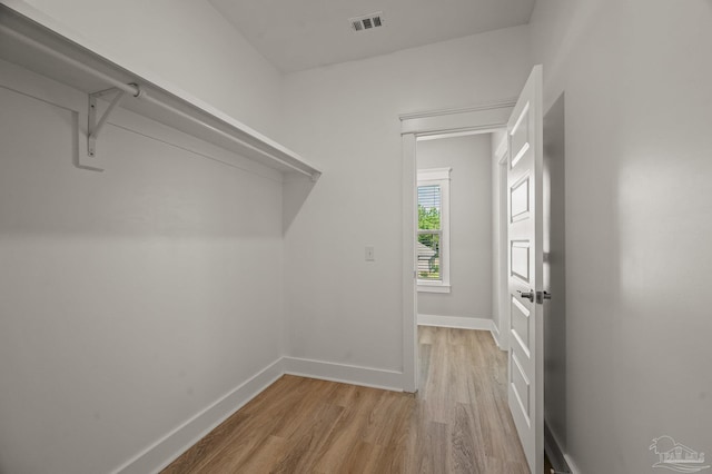 6264 Howie Way, Pace, FL 32571 - walk in closet featuring light wood finished floors
