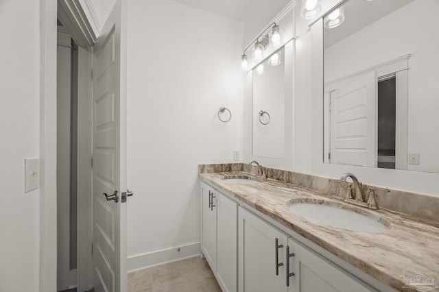 6264 Howie Way, Pace, FL 32571 - bathroom with double vanity and baseboards