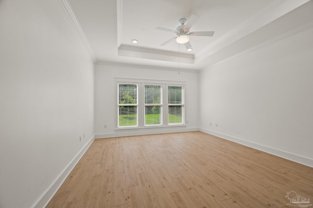 6264 Howie Way, Pace, FL 32571 - unfurnished room with ornamental molding, a raised ceiling, light wood-type flooring, and a ceiling fan