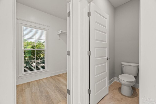 6264 Howie Way, Pace, FL 32571 - bathroom with toilet and baseboards
