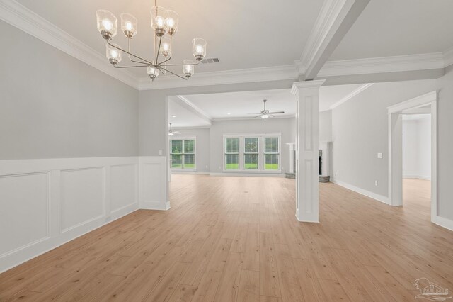 6264 Howie Way, Pace, FL 32571 - empty room featuring ornamental molding, ceiling fan, light wood-type flooring, a fireplace with raised hearth, and a chandelier
