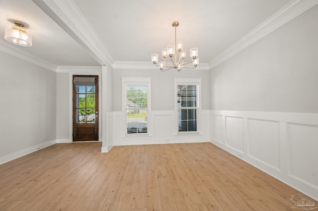 6264 Howie Way, Pace, FL 32571 - unfurnished dining area featuring light wood finished floors, ornamental molding, a chandelier, and a wainscoted wall