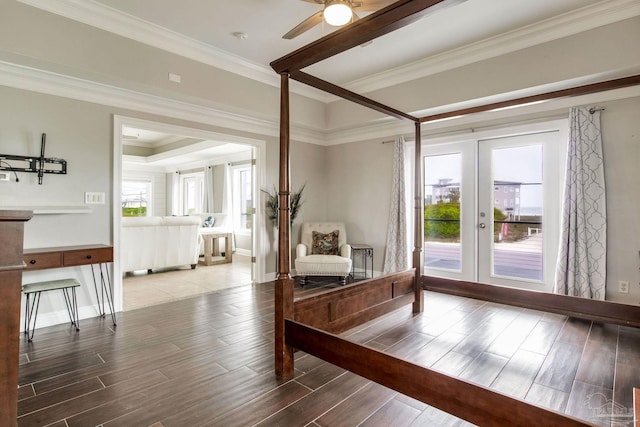 living area with french doors, baseboards, a ceiling fan, and wood finished floors