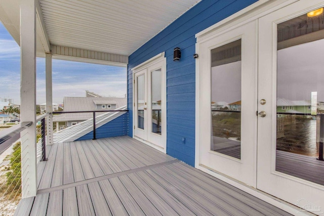 wooden terrace featuring french doors