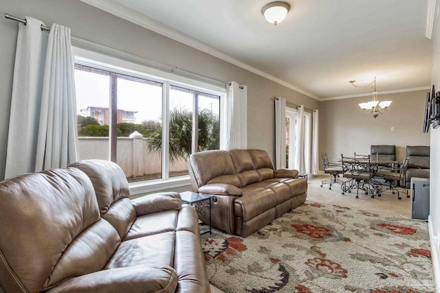 living room featuring ornamental molding, a notable chandelier, and light tile patterned floors