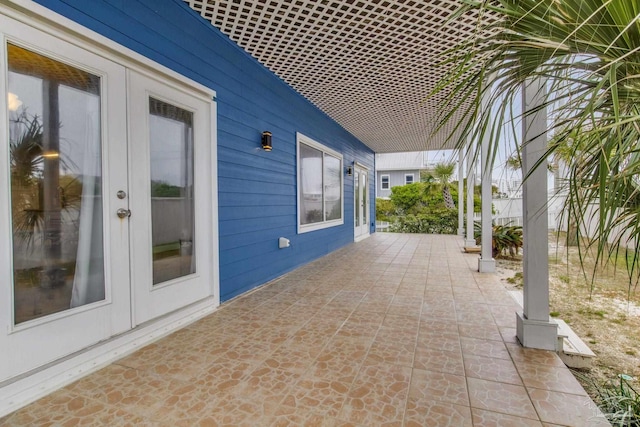 view of patio featuring french doors
