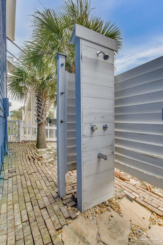 exterior details featuring fence