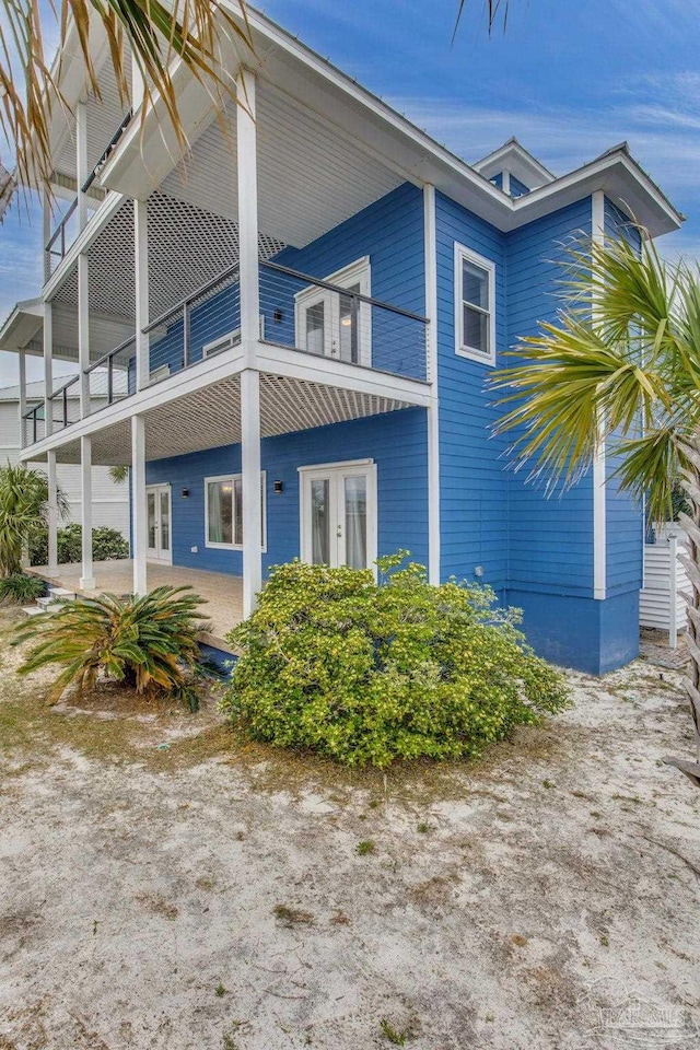 view of property exterior featuring a balcony
