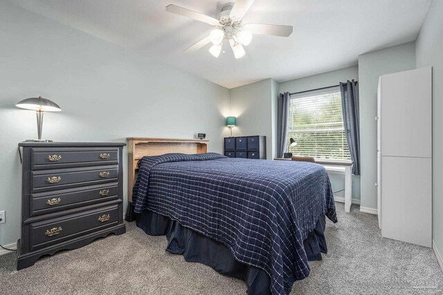 2205 Valle Escondido Dr, Pensacola, FL 32526 - carpeted bedroom featuring baseboards and ceiling fan