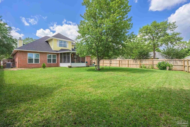 2205 Valle Escondido Dr, Pensacola, FL 32526 - view of yard featuring a sunroom and cooling unit