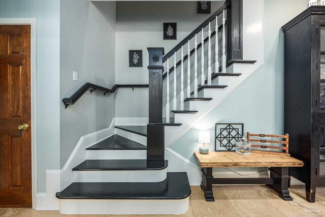 2205 Valle Escondido Dr, Pensacola, FL 32526 - stairs featuring baseboards