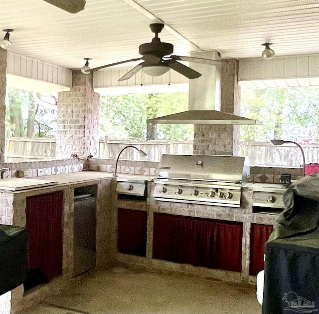 view of patio / terrace with area for grilling, exterior kitchen, and ceiling fan