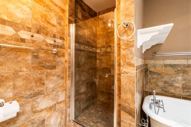 bathroom with shower with separate bathtub