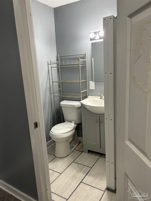 half bath with toilet and vanity